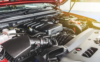 Close up of car engine with bonnet up