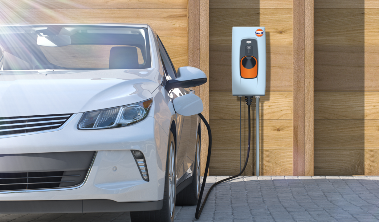 a car charging at a charging station